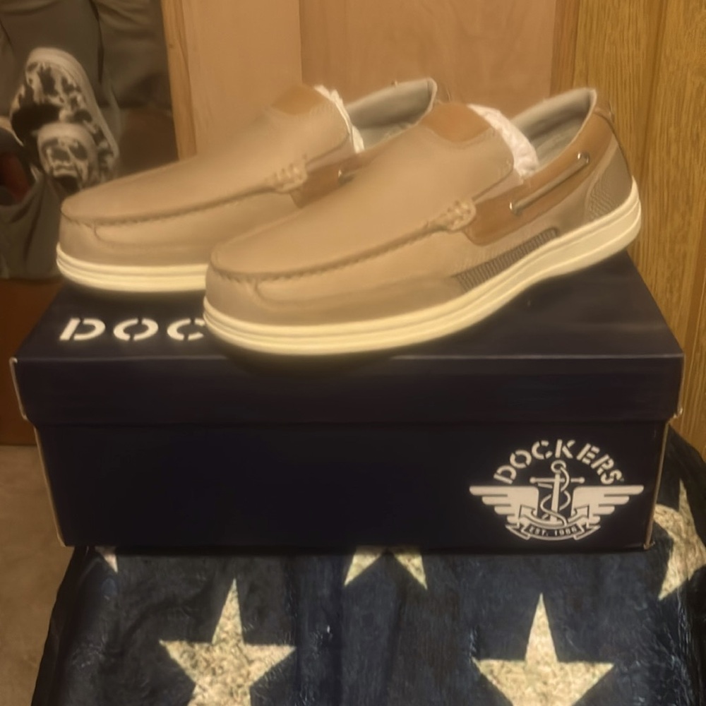 Brand new, never worn and in original box.